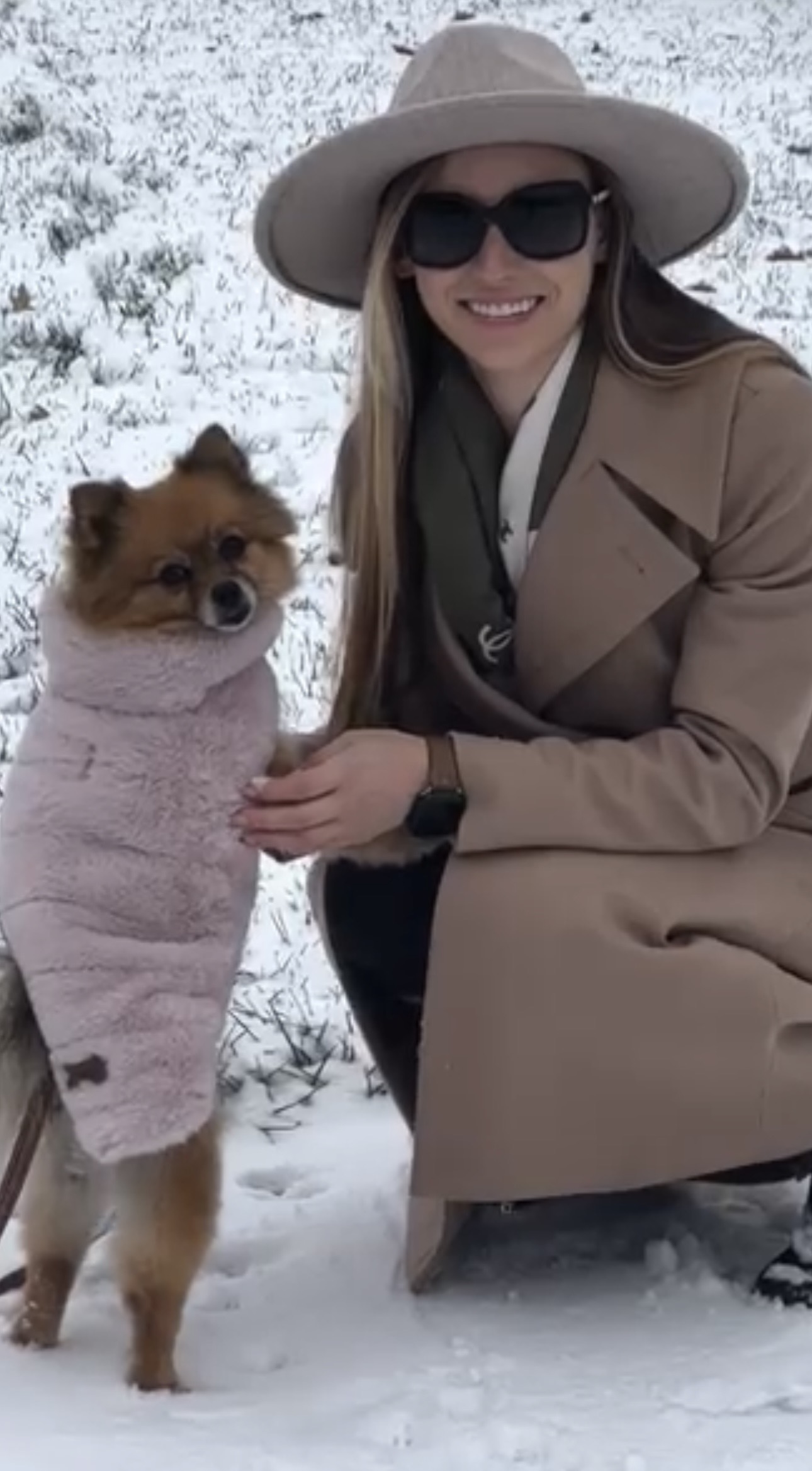 Posh Peony and her Pomeranian in matching winter outfits